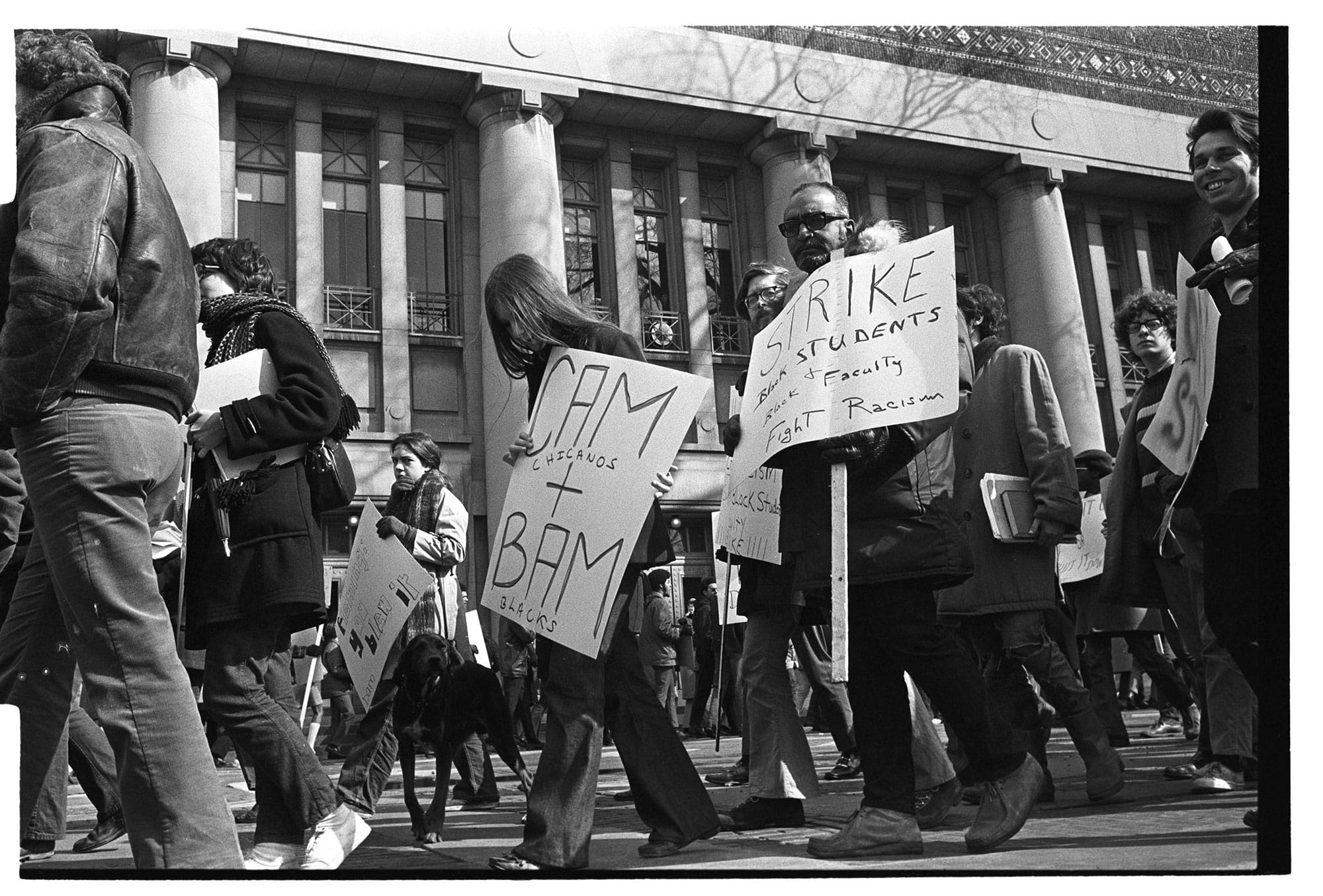 Picketers carry signs outside of Hill Auditorium at a Black Action Movement demonstration.
