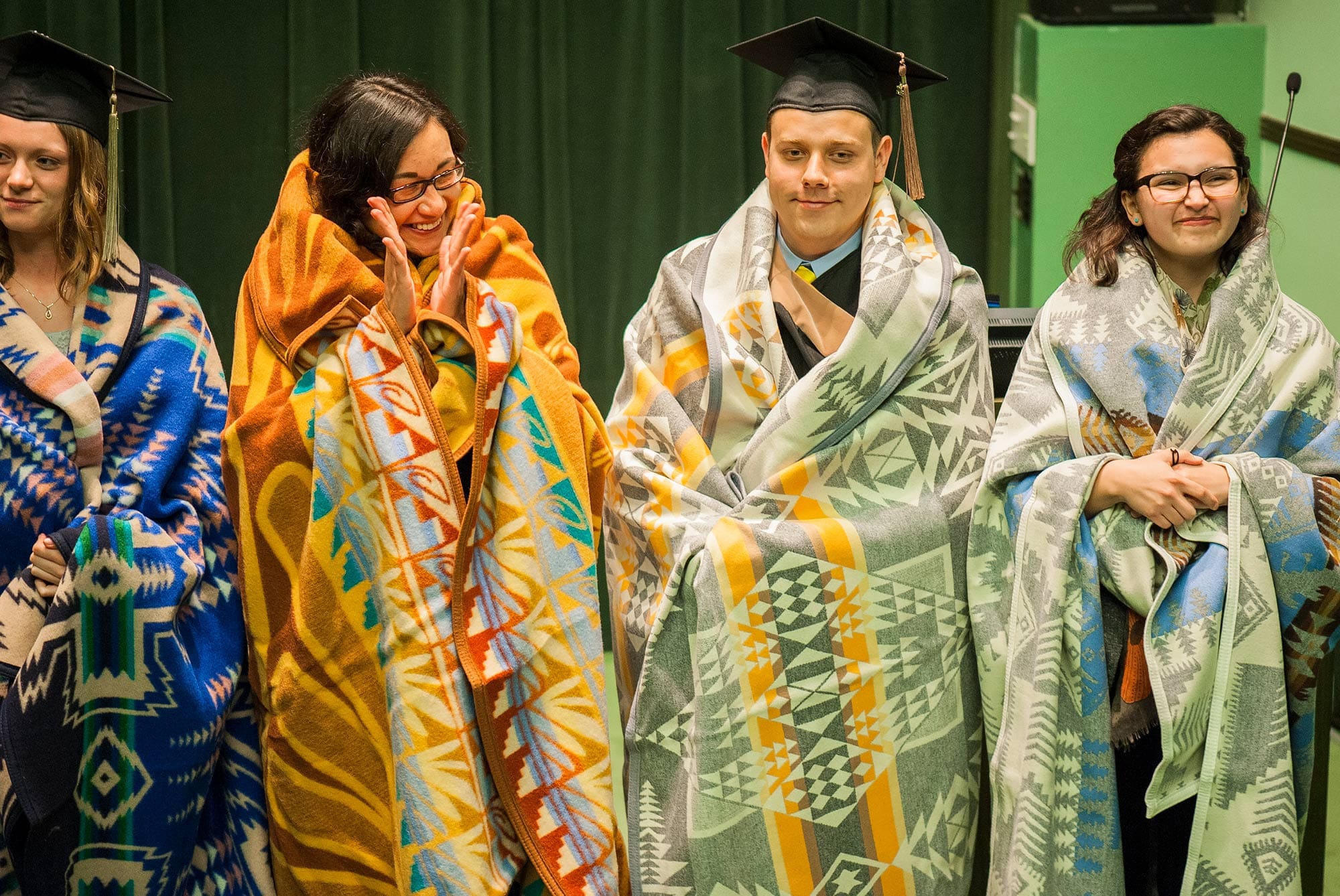 Students standing at the Native American Student Graduation Ceremony