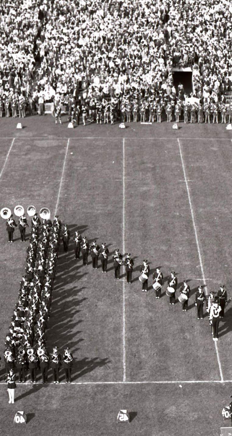 U-M Marching Band forming the Block M at the U-M vs. Michigan State football game on October 5, 1940.