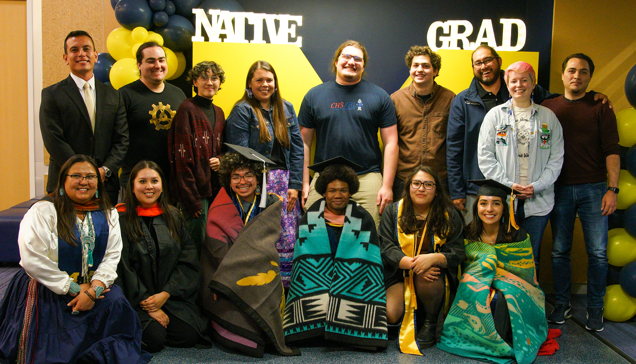 Group posed for a photograph at the Native Student Graduation Celebration.