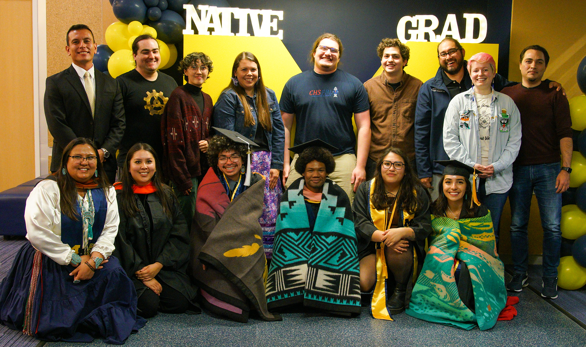 Group posed for a photograph at the Native Student Graduation Celebration.