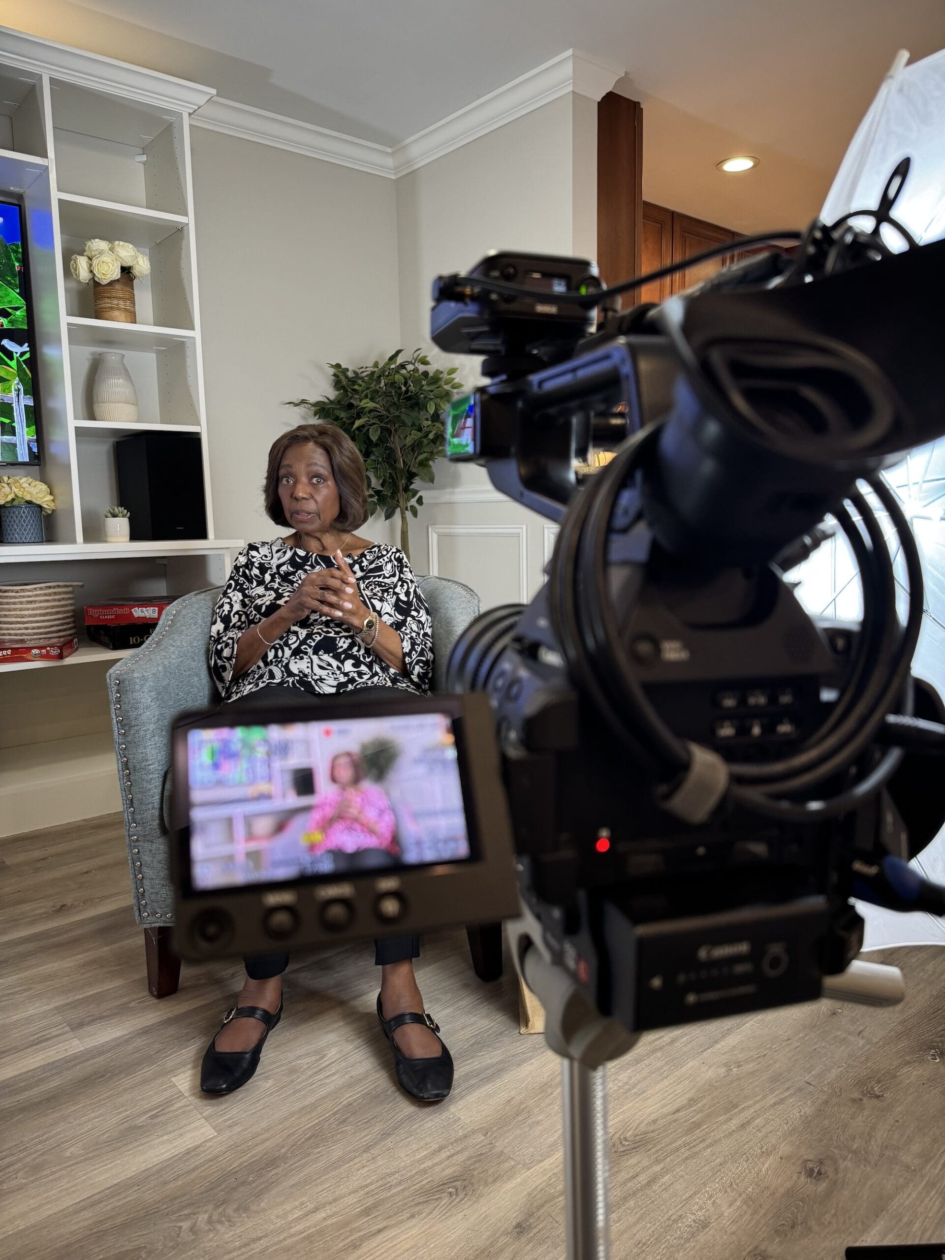 Dr. Blenda J. Wilson sitting in front of a camera during her interview.