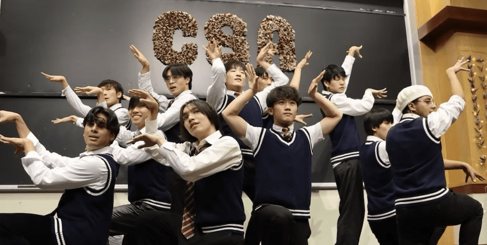 Group of students performing a dance on stage at the Celebrasia event.
