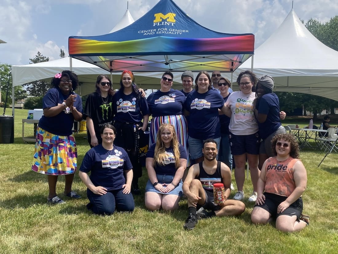 Group photo of the members of UM-Flint's Center for Gender and Sexuality at a Pride Week event.