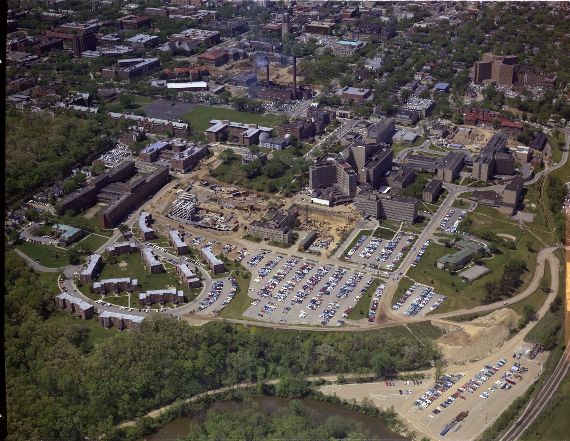 Colorized aerial view of Old Main Hospital at the University of Michigan, showing hospitals large footprint on the city of Ann Arbor and U-M campus.